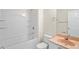 Bathroom featuring a tub/shower combo and single sink vanity with a peach marble countertop at 7249 Bridgeview Dr, Wesley Chapel, FL 33545