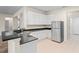 Kitchen featuring granite countertops, stainless steel appliances, and ample cabinet space at 7249 Bridgeview Dr, Wesley Chapel, FL 33545