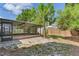 An expansive outdoor screened patio with ample space for seating and entertaining, leading to a fenced yard at 7500 16Th N St, St Petersburg, FL 33702