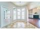 Bright breakfast nook with access to a patio at 10219 Millport Dr, Tampa, FL 33626