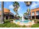 Vibrant community center with a fountain and palm trees, surrounded by shops and restaurants, offering a lively atmosphere at 10219 Millport Dr, Tampa, FL 33626