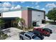 Exterior shot of the community gym showcasing its brick facade, ample parking, and well-maintained landscaping at 10219 Millport Dr, Tampa, FL 33626