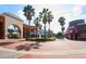 Charming town center with palm tree-lined streets, fountains, and vibrant storefronts at 10219 Millport Dr, Tampa, FL 33626