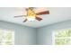 This bedroom features natural light with a ceiling fan at 106 Avery Ave, Crystal Beach, FL 34681
