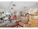 Open dining area with hardwood floors, connecting the kitchen and living spaces at 108 Shore Dr, Tarpon Springs, FL 34689