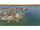 Waterfront home with pool and dock, set among other homes in a coastal community at 11000 8Th E St, Treasure Island, FL 33706