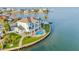 Waterfront home with lush lawns, an infinity pool, and private dock at 11000 8Th E St, Treasure Island, FL 33706