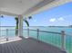 Expansive balcony offering breathtaking views of turquoise waters and the cityscape at 11000 8Th E St, Treasure Island, FL 33706