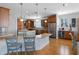 Gourmet kitchen featuring custom cabinetry, granite counters, stainless steel appliances, and spacious island at 11000 8Th E St, Treasure Island, FL 33706
