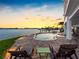 Beautiful pool area with comfortable lounge chairs, perfect for soaking up the sun and enjoying the bay view at 11000 8Th E St, Treasure Island, FL 33706