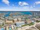 High aerial view of the city skyline with an ocean backdrop at 11500 Gulf Blvd # 513, Treasure Island, FL 33706