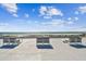 Expansive rooftop patio offering stunning ocean views and ample seating for relaxation at 11500 Gulf Blvd # 513, Treasure Island, FL 33706