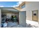 An attached storage shed provides extra room to store a lawnmower and other outdoor equipment at 11974 Rosetree S Pl, Seminole, FL 33772