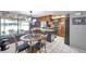 Eat-in kitchen features breakfast nook, stainless appliances, and plenty of natural lighting at 11974 Rosetree S Pl, Seminole, FL 33772