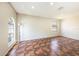 Bright and airy bedroom with unique windows and tile flooring at 12510 Sparkleberry Rd, Tampa, FL 33626
