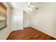 Bedroom featuring laminate floors, natural light, closet, and neutral paint at 12510 Sparkleberry Rd, Tampa, FL 33626