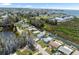 Aerial view of waterfront homes with canal access to the open bay waters at 14409 Birch St, Hudson, FL 34667