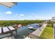 Beautiful backyard waterway views with mature mangroves and a boat dock at 14409 Birch St, Hudson, FL 34667