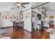 Cozy dining area features a wood table with seating for four, next to the living area at 14409 Birch St, Hudson, FL 34667