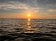 Beautiful sunset view reflecting on the water at 14409 Birch St, Hudson, FL 34667