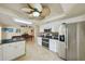 Bright kitchen with granite counters, stainless appliances, seamlessly flowing to a game room at 14564 110Th Ter, Largo, FL 33774