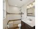 Bathroom shower featuring white subway tile, decorative accent strip and updated shower fixtures at 14564 110Th Ter, Largo, FL 33774
