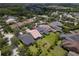 Aerial view of the home and its neighborhood, showcasing the lush landscaping and community layout at 14610 Mondavi Ct, Tampa, FL 33626