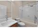 Bathroom featuring a shower-tub combo and a marble vanity at 14610 Mondavi Ct, Tampa, FL 33626