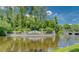 Community entrance sign featuring landscaping and water features at 14610 Mondavi Ct, Tampa, FL 33626