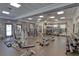Well-equipped fitness center with modern weight machines, free weights and mirrors, ensuring comprehensive workouts at 14610 Mondavi Ct, Tampa, FL 33626