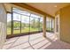 Enjoy outdoor living on this screened-in lanai with brick pavers and a lush backyard view at 14610 Mondavi Ct, Tampa, FL 33626