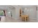 Bright, open living space that flows into dining area and kitchen with island at 14610 Mondavi Ct, Tampa, FL 33626