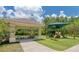 Playground and picnic area featuring shaded seating and playground equipment for outdoor enjoyment at 14610 Mondavi Ct, Tampa, FL 33626