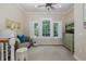 Bright bonus room featuring a comfortable seating area, natural light, and modern décor at 1834 Daiquiri Ln, Lutz, FL 33549