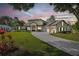 Charming two-story home features a well-manicured lawn, driveway, and a three-car garage at 1834 Daiquiri Ln, Lutz, FL 33549