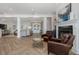Spacious living room featuring wood floors, an open layout, and modern decor at 1834 Daiquiri Ln, Lutz, FL 33549