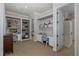 Bright home office featuring built-in shelves and dual desk spaces, perfect for a productive work environment at 1834 Daiquiri Ln, Lutz, FL 33549