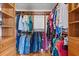 Well-organized walk-in closet features ample hanging space and built-in shelving units at 212 W Powhatan Ave, Tampa, FL 33604