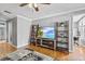 Cozy living room features stylish decor, hardwood floors, and abundant natural light at 212 W Powhatan Ave, Tampa, FL 33604