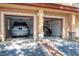 Two-car garages showcasing car parking spaces and easy access for residents at 2173 Tuscany Trce # 8, Palm Harbor, FL 34683