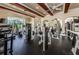 Well-equipped fitness center with a variety of modern exercise machines and large windows at 2173 Tuscany Trce # 8, Palm Harbor, FL 34683