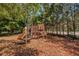 Colorful playground with slides, climbing structures, and soft mulch ground cover at 2173 Tuscany Trce # 8, Palm Harbor, FL 34683