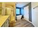 Modern bathroom featuring a glass shower, soaking tub, and luxury finishes at 2325 Via Bella Blvd, Land O Lakes, FL 34639
