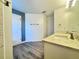 Bathroom featuring granite vanity, modern fixtures, and ample space at 2325 Via Bella Blvd, Land O Lakes, FL 34639