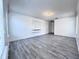 Spacious living room with modern flooring and plenty of natural light at 2325 Via Bella Blvd, Land O Lakes, FL 34639