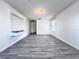 Living room featuring stylish flooring and updated fixtures, perfect for entertaining at 2325 Via Bella Blvd, Land O Lakes, FL 34639