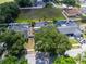 Aerial view of property, neighborhood and surrounding trees at 2619 Green Valley St, Valrico, FL 33596