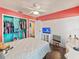 Bedroom showcasing an open closet and hardwood floors at 2619 Green Valley St, Valrico, FL 33596