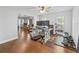Spacious living room showcasing hardwood floors and lots of natural light at 2619 Green Valley St, Valrico, FL 33596