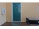 Condo front door with bench and lock box at 2705 Via Murano # 127, Clearwater, FL 33764